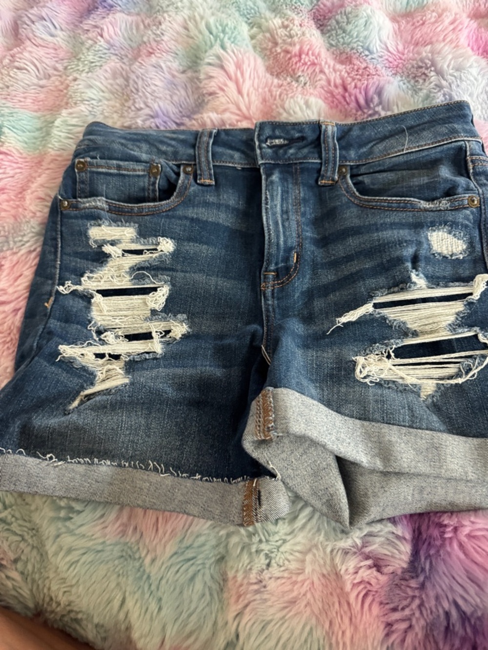 American Eagle Outfitters Ripped Rolled-Hem Denim Shorts in Blue